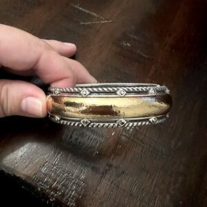 Brighton bracelet, silver and gold. Hinge closure.